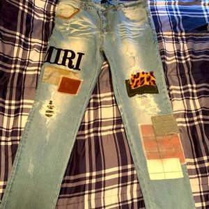 Amiri distressed patchwork jeans